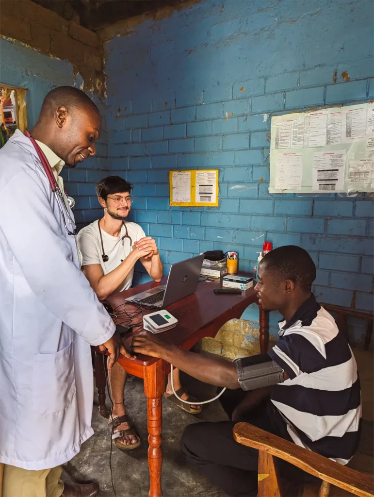 Doctor volunteering by seeing patients